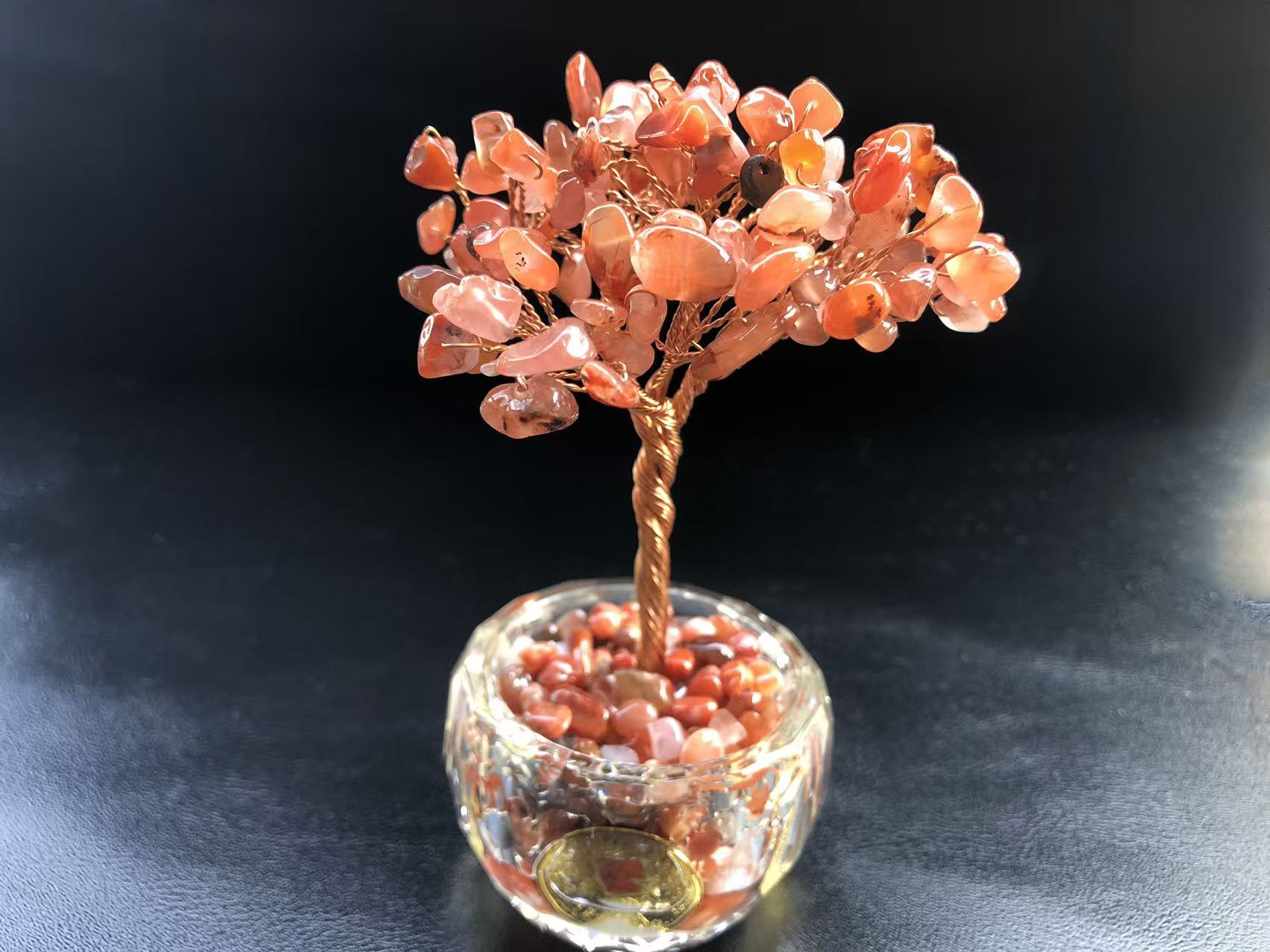 How does the red agate crystal tree work in Feng Shui